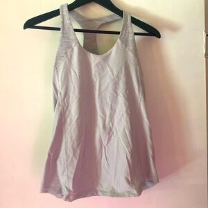 White Lululemon tank top with adjustable built in bra